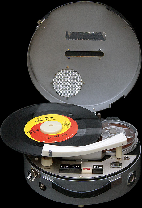 It's a recorder. It's a radio, It's a phonograph. It's three, three, three products in one!